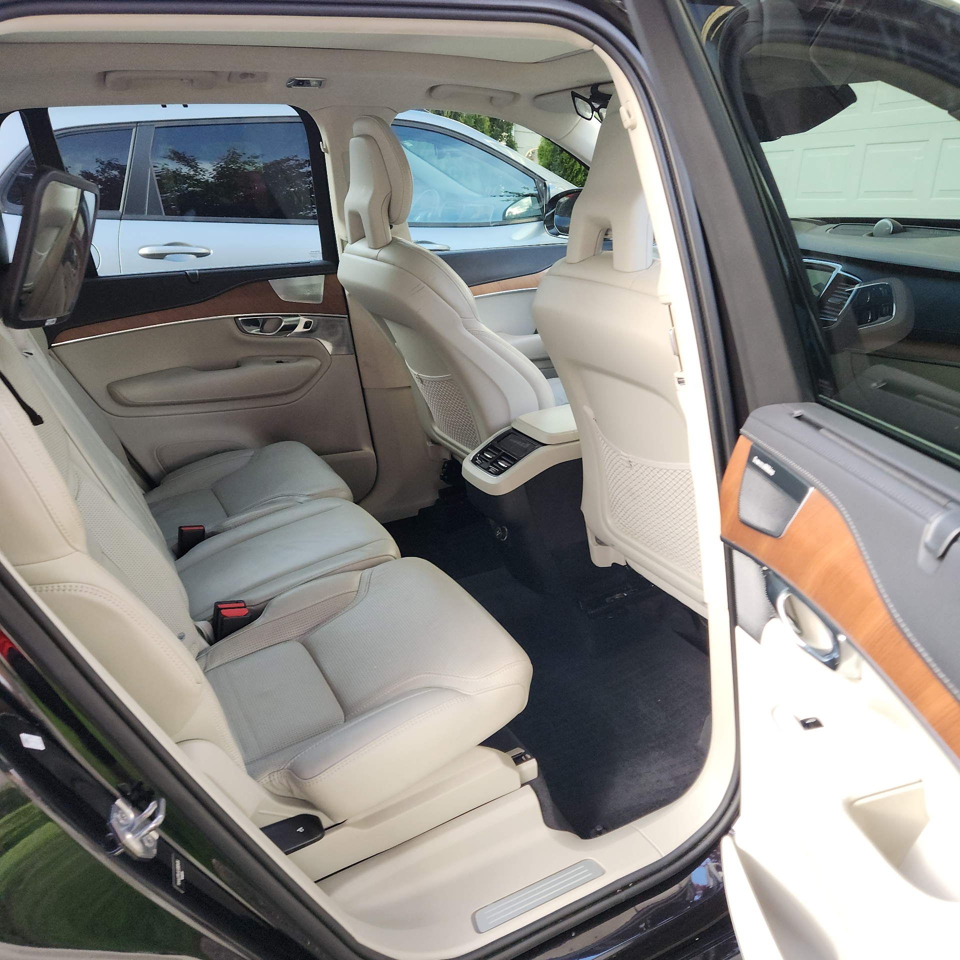 Luxury SUV cream interior rear seating