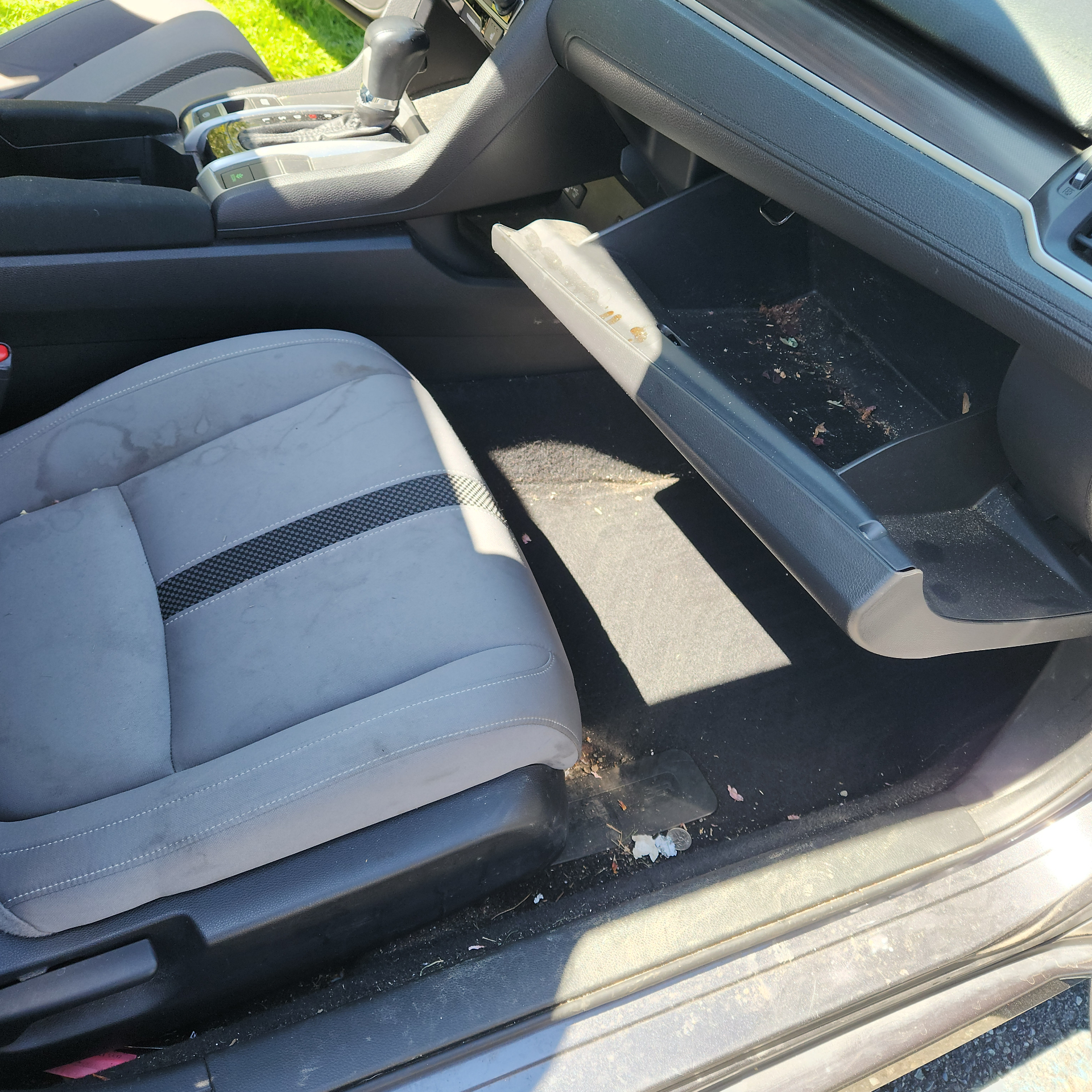 Dirty Honda CR-V interior before detailing with debris and stains